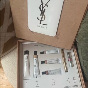 Yves Saint Laurent Beauty Collection with Gold and Silver Accents
